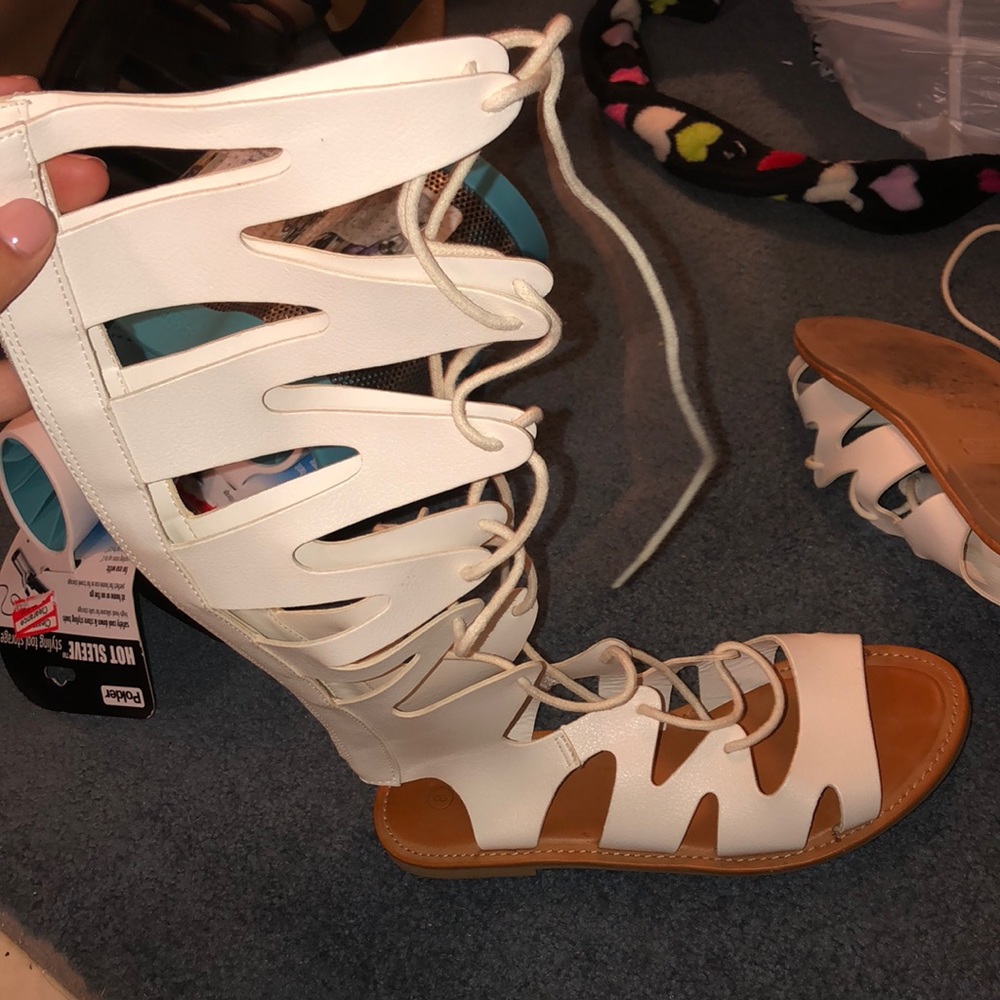 Black and white gladiator sandals